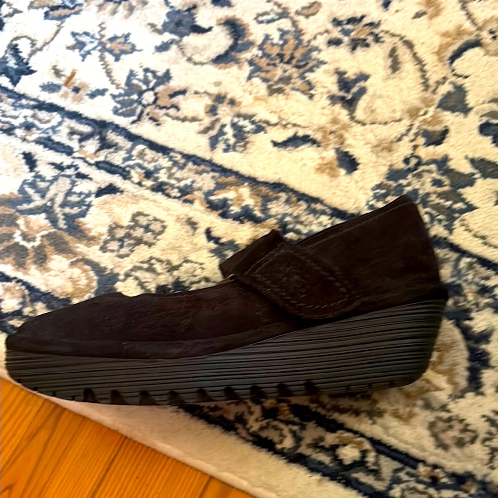 Fly London Black Platform Slip-On Shoes